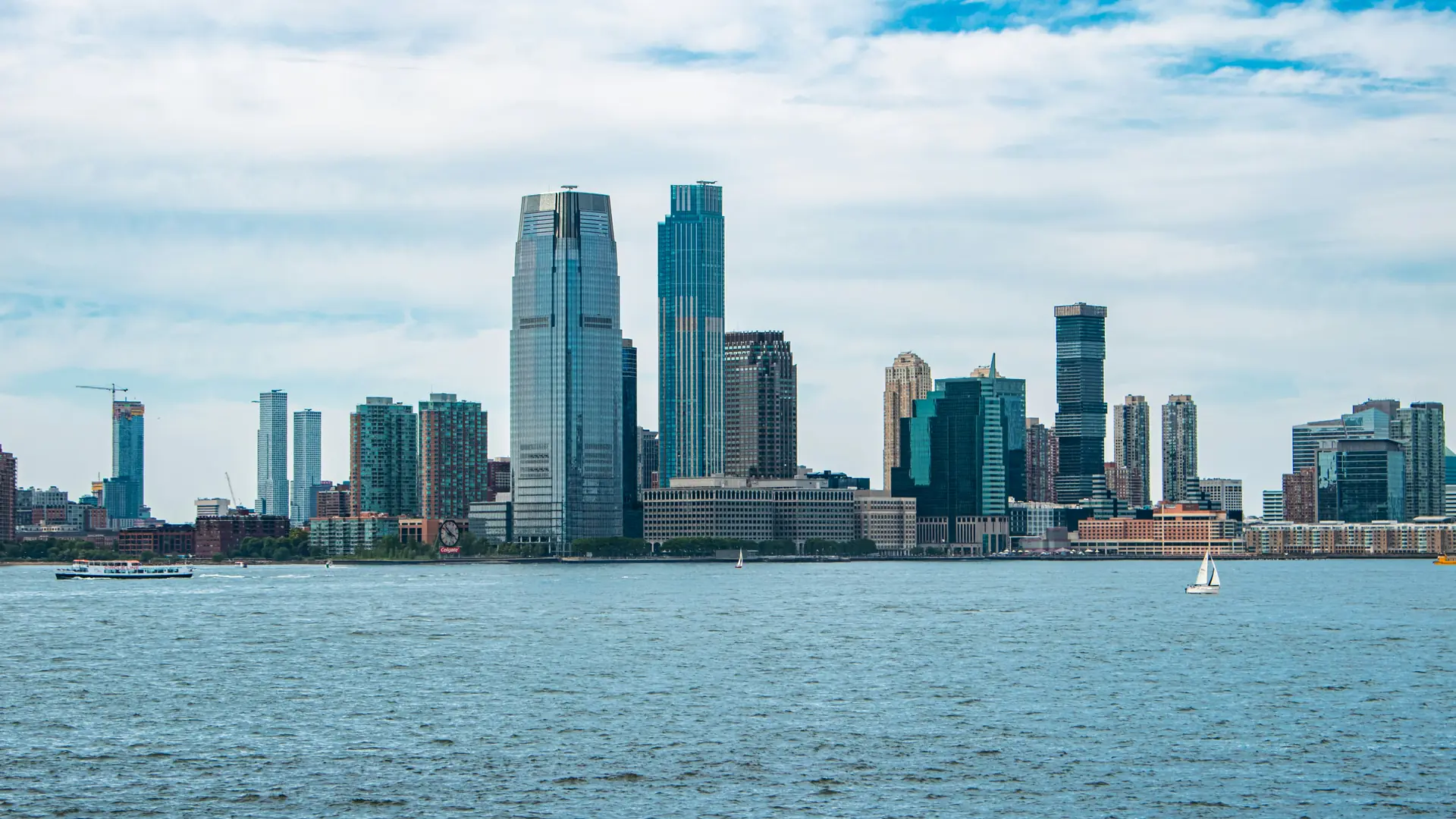 The Jersey City skyline on the Hudson River at dusk